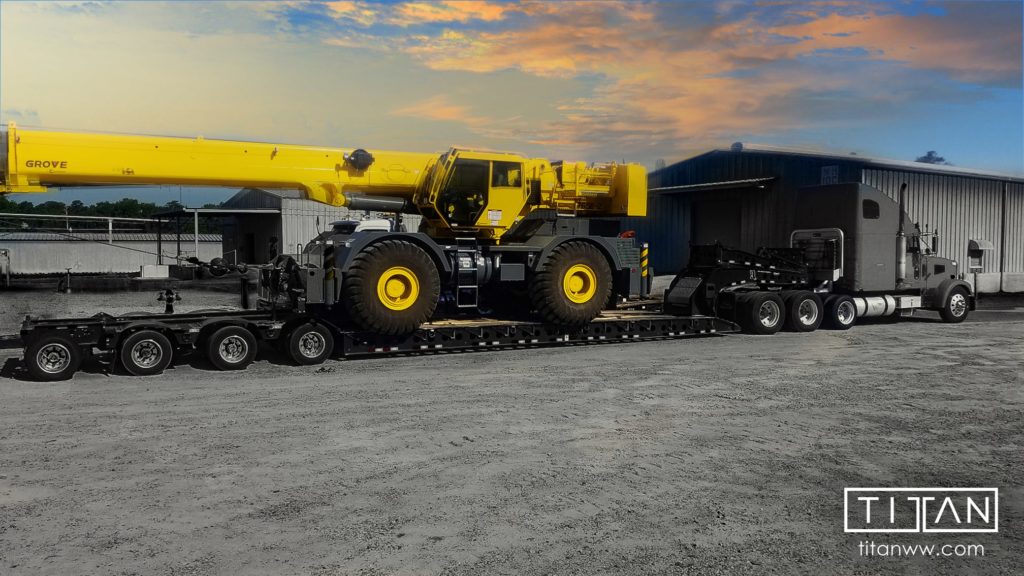 heavy haul truck transporting a crane